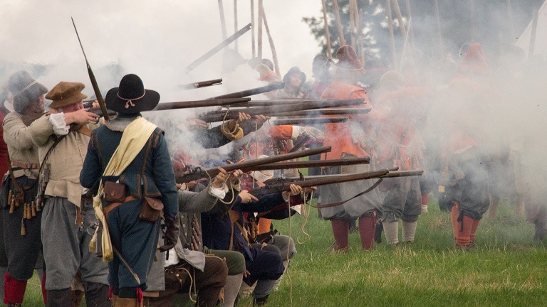 A re-enactment of one of the battles of the English Civil War, featuring actors with period uniform and weaponry. 