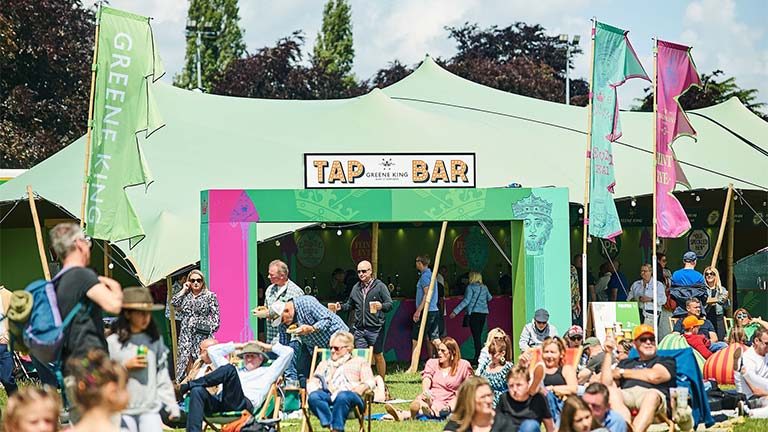 One of the many colourful tents at Pub in the Park