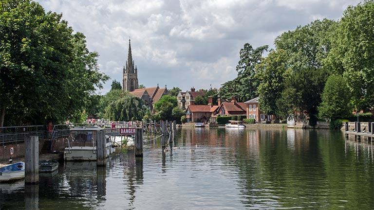 Looking down the River Thames in Marlow towards the All Saints Church in the background