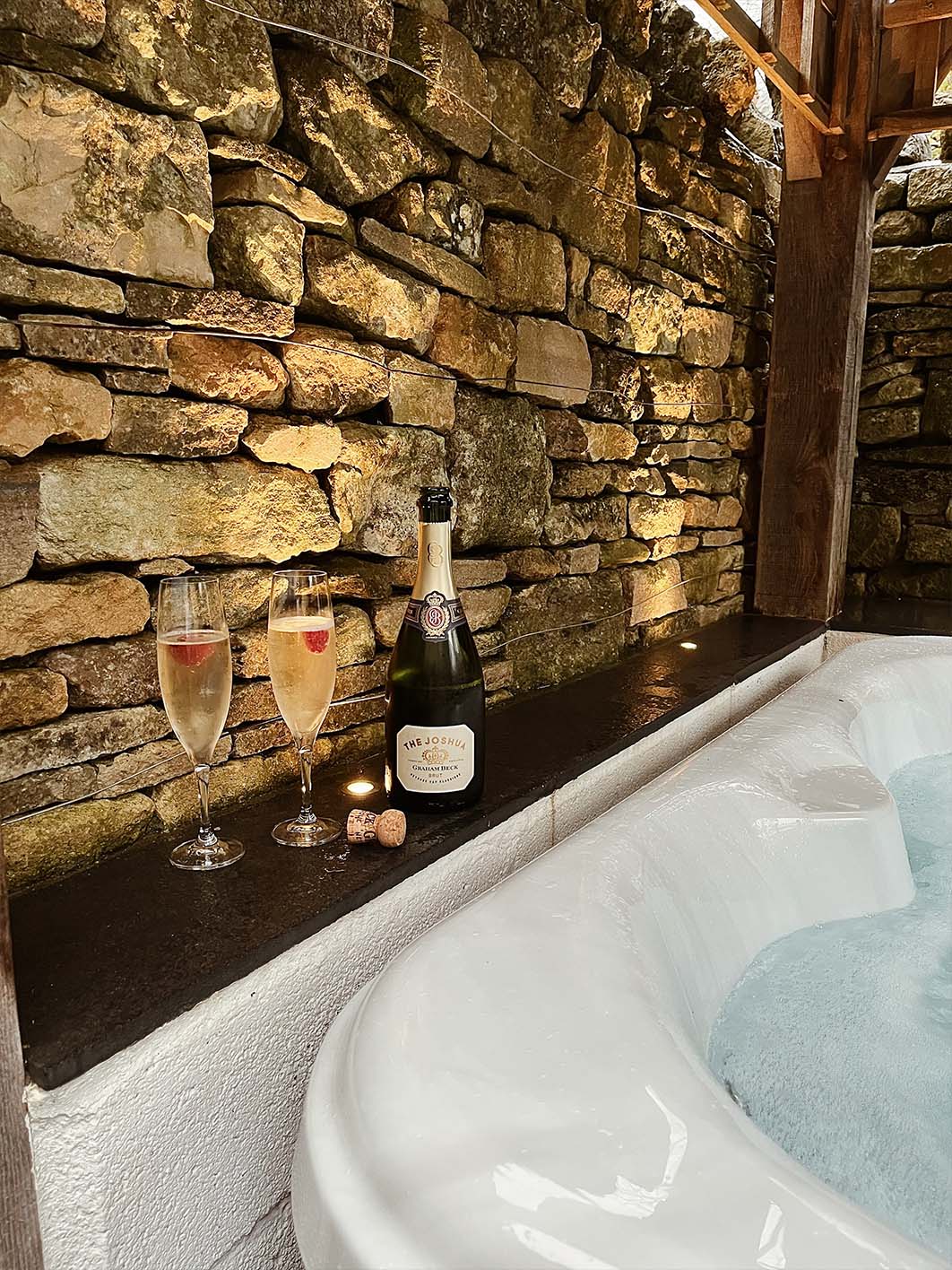 Champagne and hot tub at Burghope