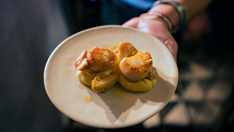 A scallop dishes presented by Verdant Seafood Bar in Falmouth