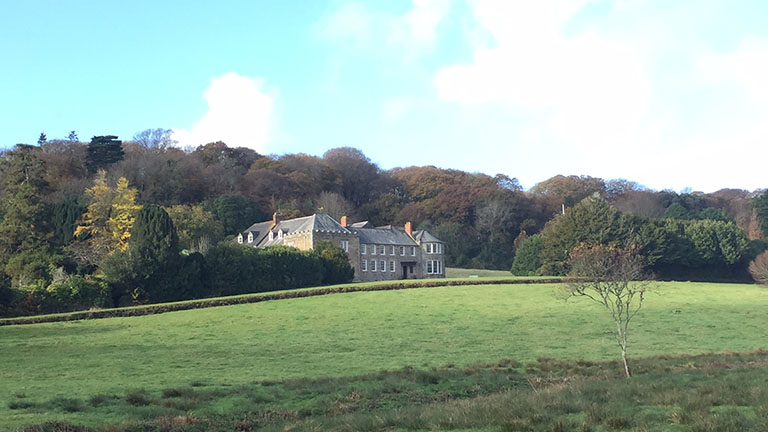 A view towards the grand main house of Penrose Estate near Porthleven 