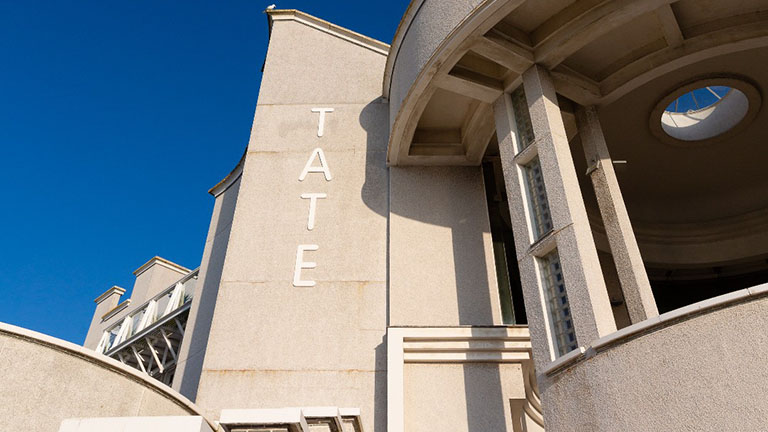 Blue skies and the outer walls of the Tate St Ives gallery, one of the most famous art galleries in Cornwall