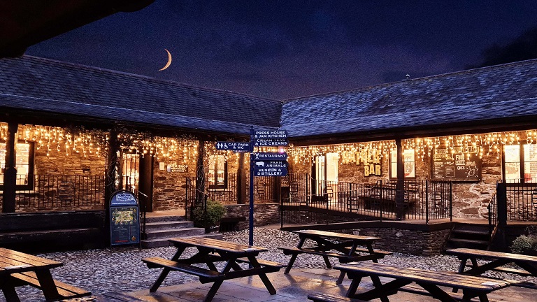 Healey's Cyder Farm at night with Christmas lights and snow