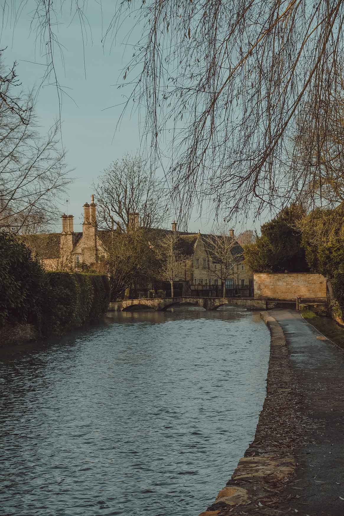 A waterside view of Bourton-on-the-Water in the Cotswolds