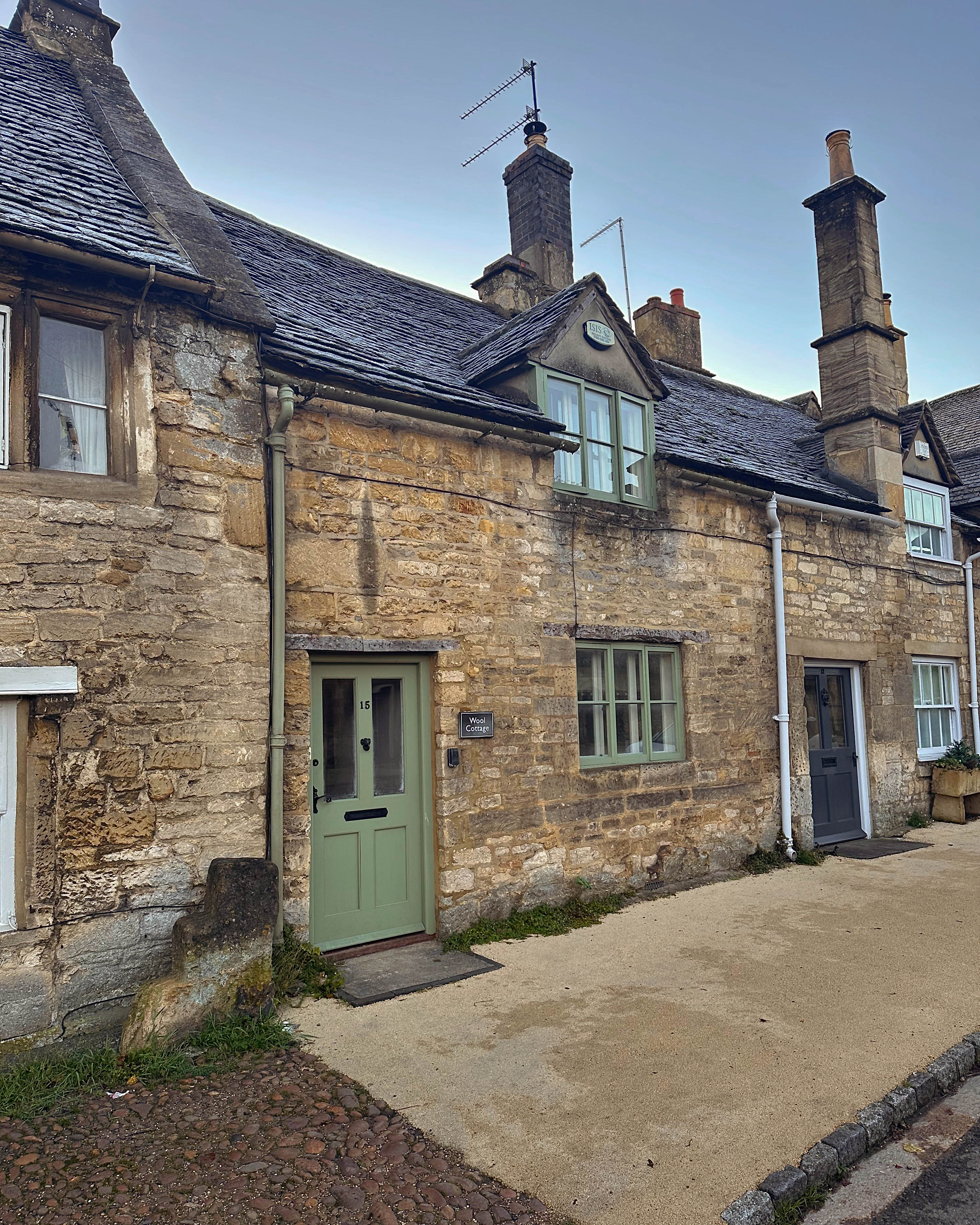 The honey-hued exteriors of Wool Cottage, Burford
