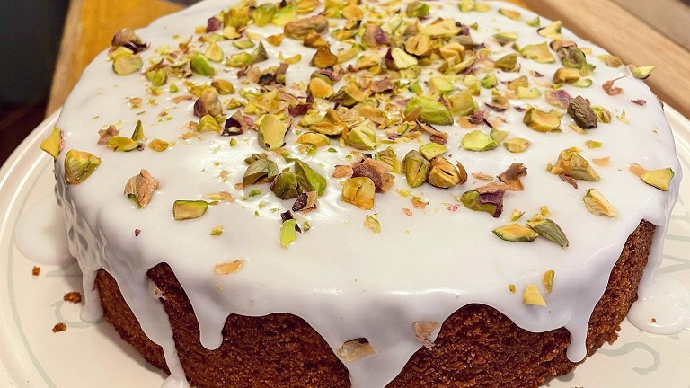 A delicious cake topped with icing and pistachios, baked by one of the chefs at the Narrowbar Cafe in Penryn