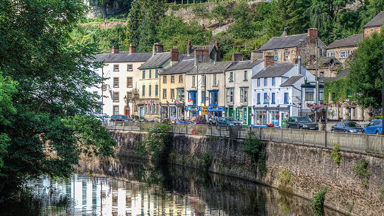 A view of cottages and houses overlooking the River Wye in Matlock Bath in the Derbyshire Peak District