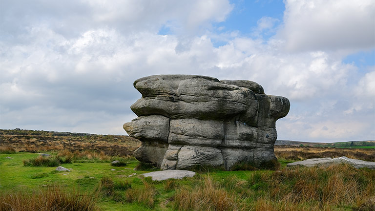 The famous wind-shaped eagle stone at Baslow Edge in the Peak District