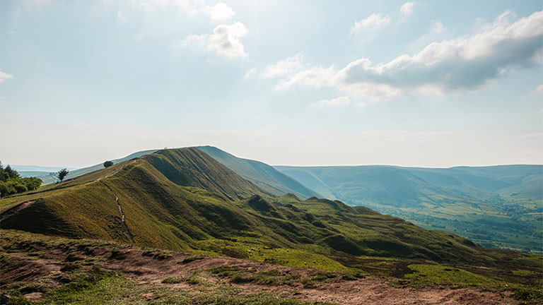 Rolling peaks and fields at Mam Tor in Hope Valley in the Peak District