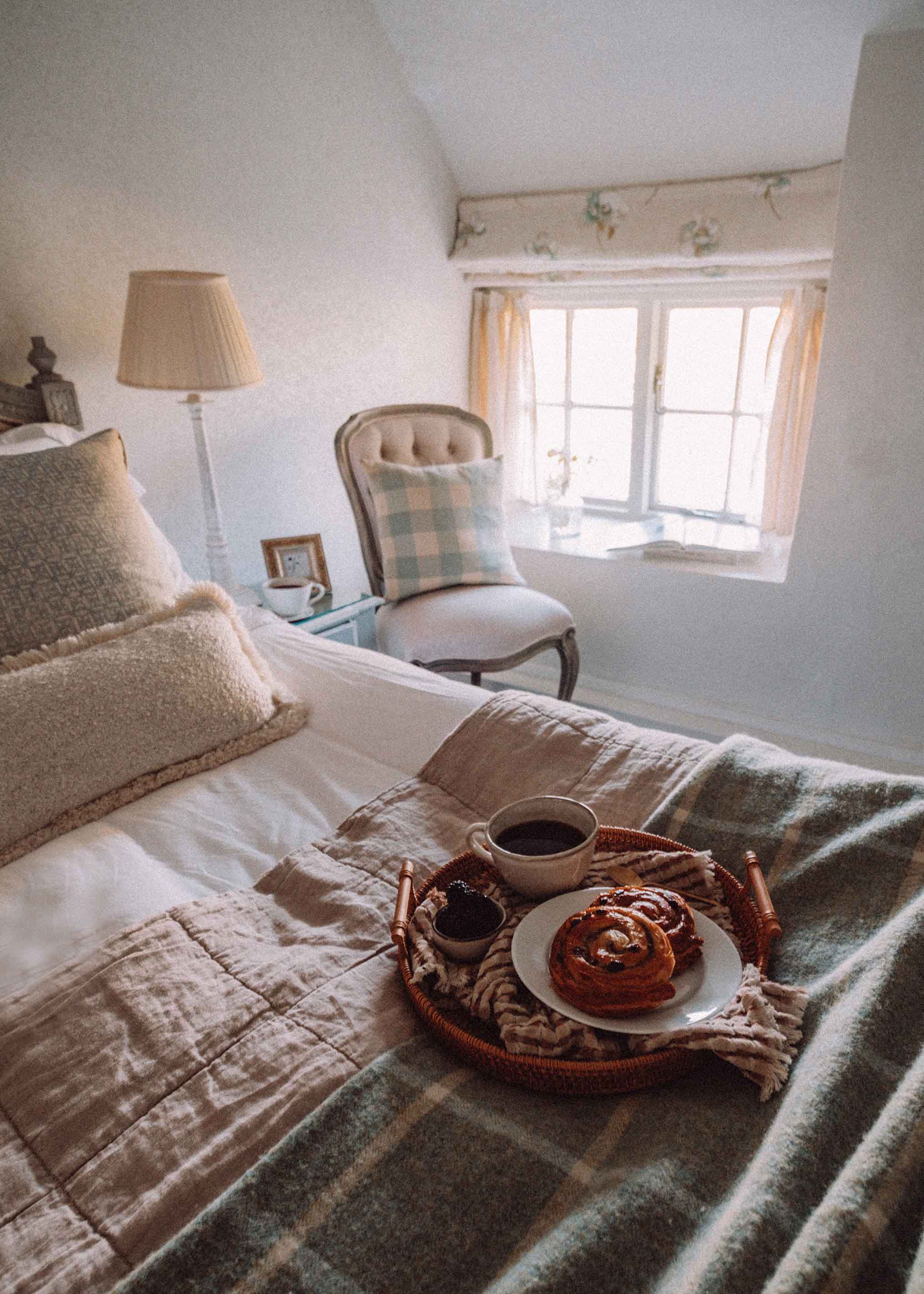 Enjoying pastries and coffee in bed at Sojourn