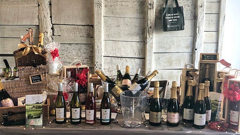 A stall full of local wine at the Mapperton Christmas Market
