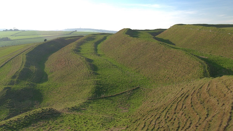 Old ramparts of Maiden Castle near Dorchester, one of the largest and most important Iron Age hillforts in Europe