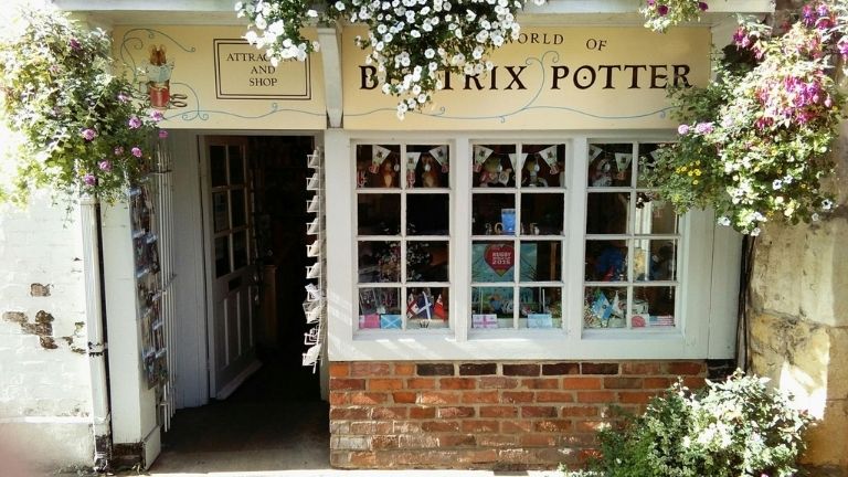 The quaint shop front of Beatrix Potter's The House of the Tailor of Gloucester