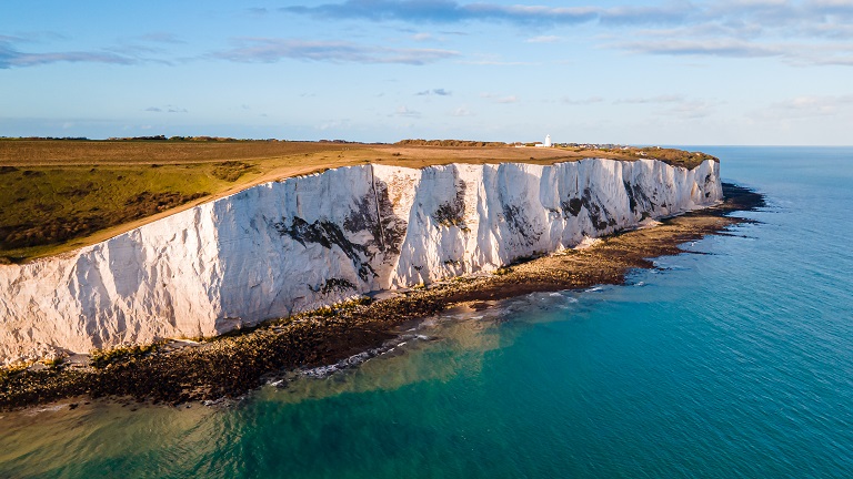 A panoramic view of the White Cliffs of Dover overlooking the English Channel in Kent