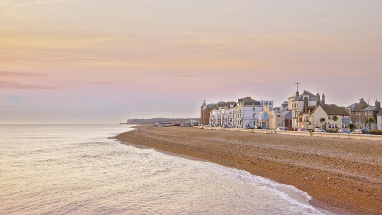A view of Deal Beach in Kent from the sea overlooking the beach and Deal's seafront townhouses 