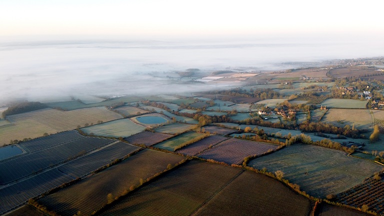 A low mist shrouding the countryside near West Malling in Kent