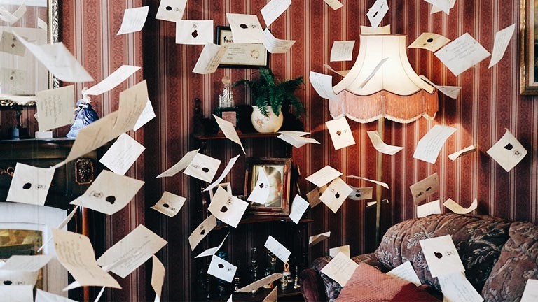 Hundreds of letters falling from the ceiling in the set of the Dursley's living room at the Warner Bros. Studio Tour in London