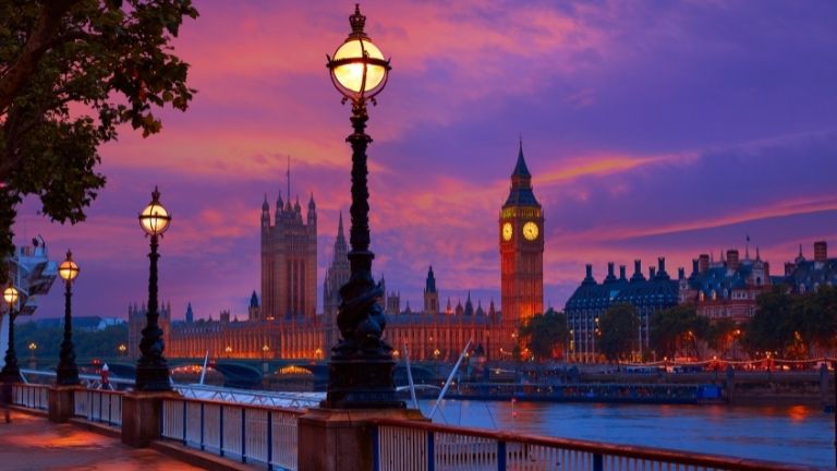 A romantic stroll along the Thames at dusk in London