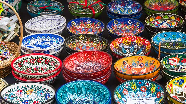 A selection of brightly coloured bowls at Brick Lane Market