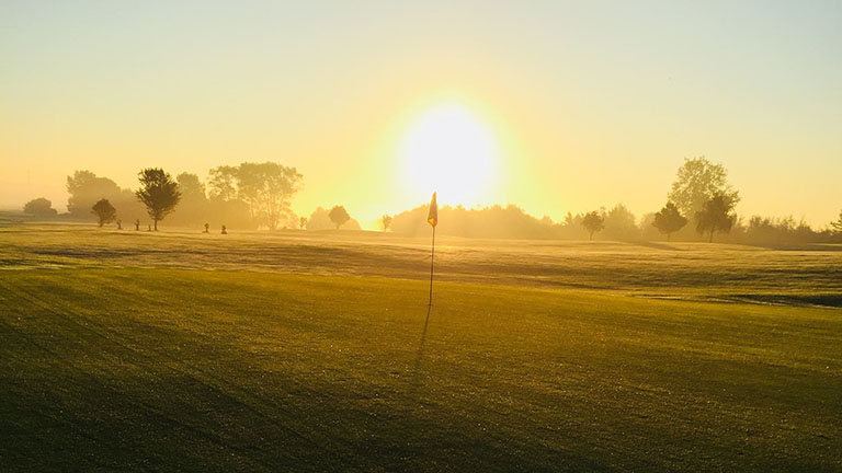Image of Cannington Golf Course in Somerset with the setting sun