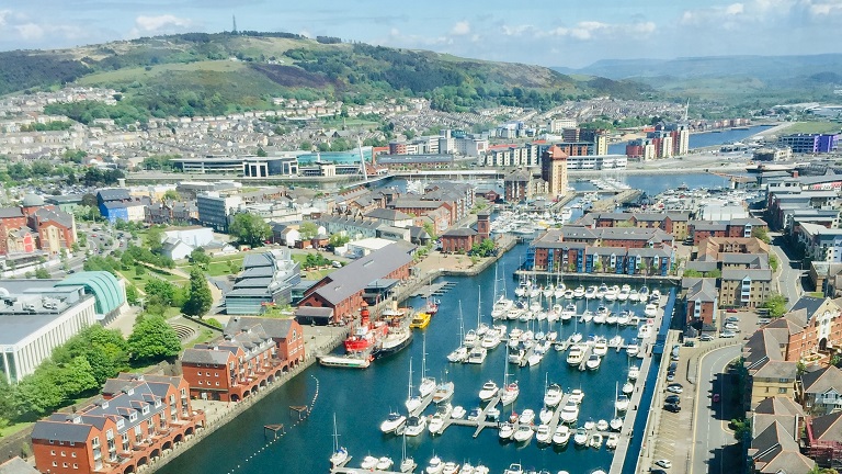 A view of Swansea Marina with the National Waterfront Museum set next to the water