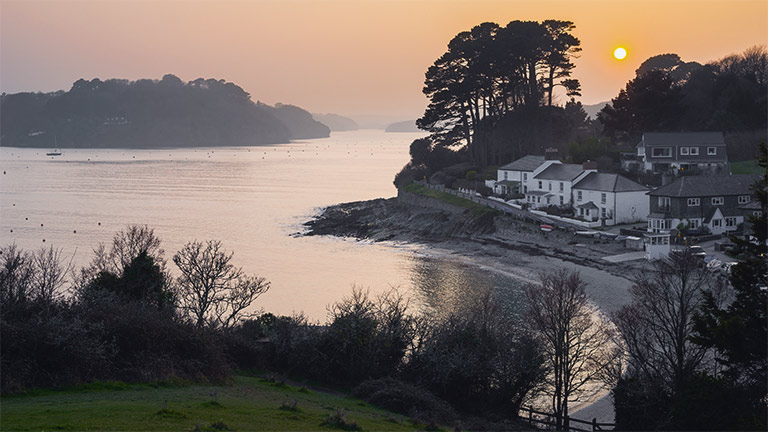 A view of Helford Passage Beach at sunset 