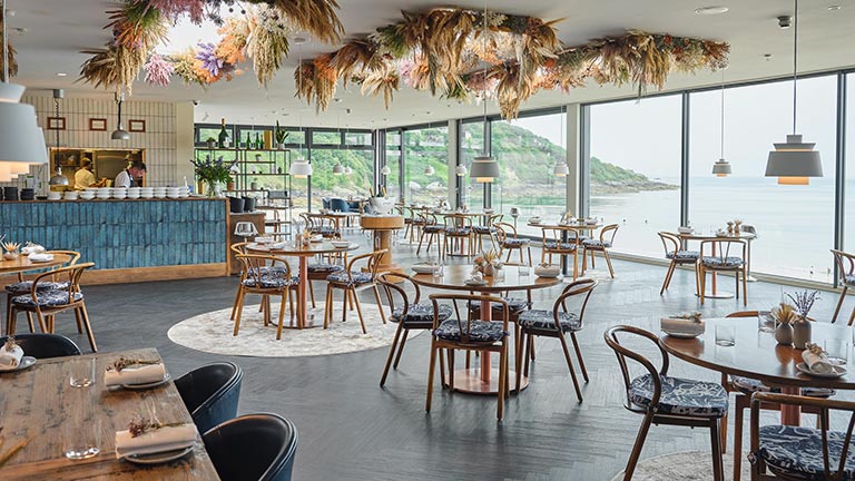 Inside the glass-fronted interiors of the Ugly Butterfly restaurant in St Ives