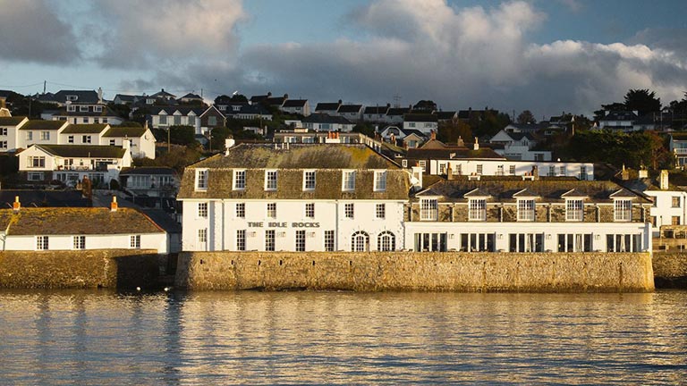 A harbour view of The Idle Rocks restaurant overlooking the water in St Mawes