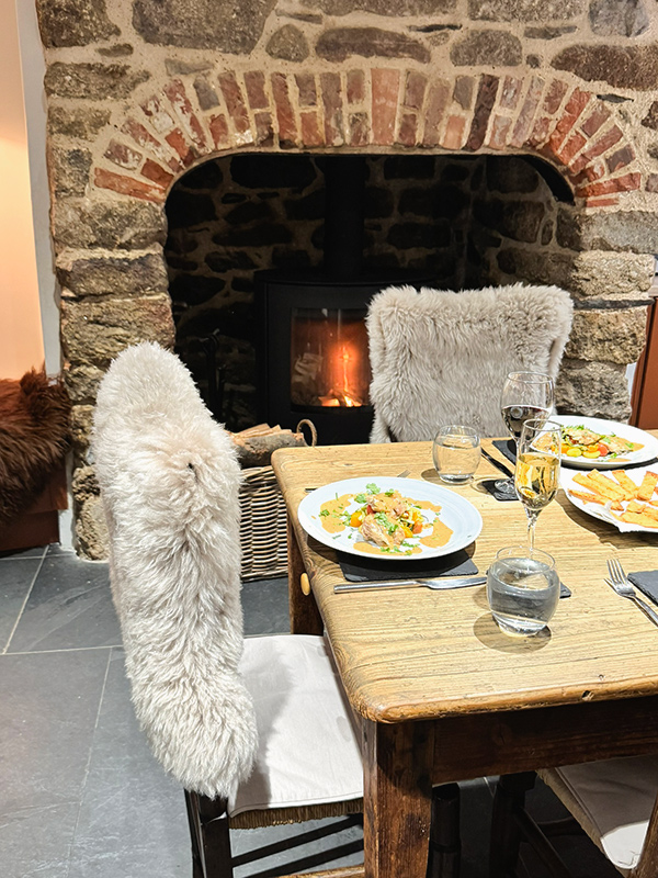 A meal on the farmhouse kitchen table at Crabbers