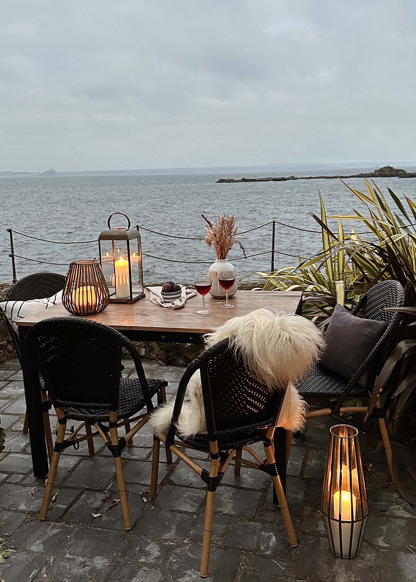 Seafront terrace at Rocksalt at dusk