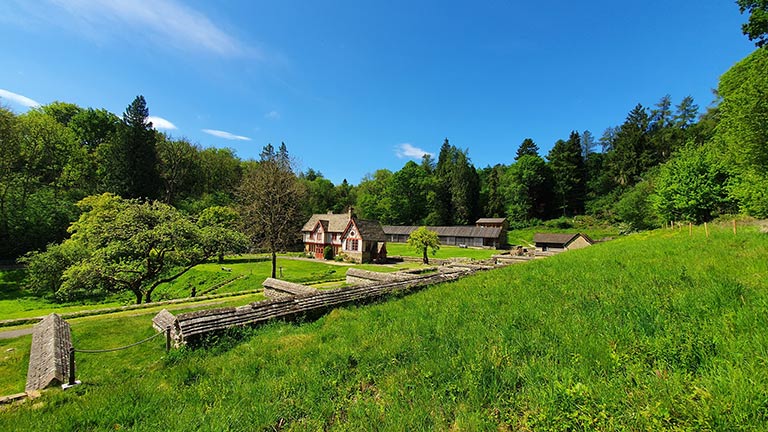 Blue skies over the National Trust's Chedworth Roman Village and Museum in the Cotswolds