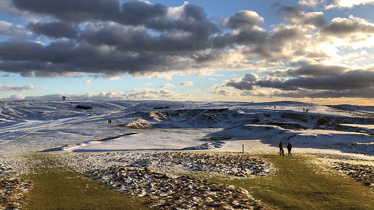 A powdering of snow atop Cleeve Hill in the Cotswolds in winter