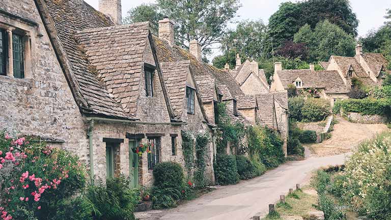 A line of characterful cottages at Arlington Row in the Cotswolds