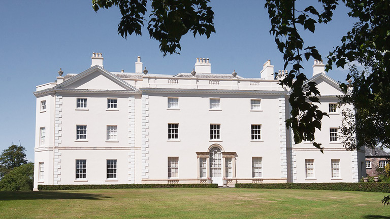 The white façade of Saltram House near Plymouth, Devon