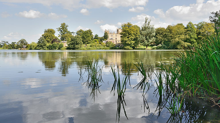 Sherborne Castle reflected in the water of Brown's Lake