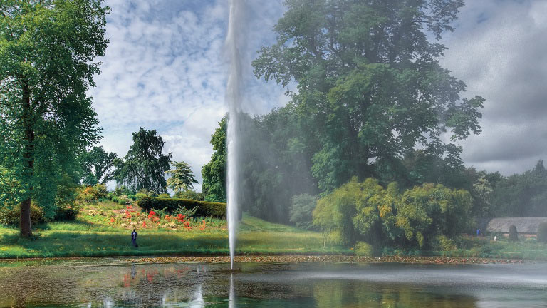 A picturesque water fountain in the gardens of Forde Abbey