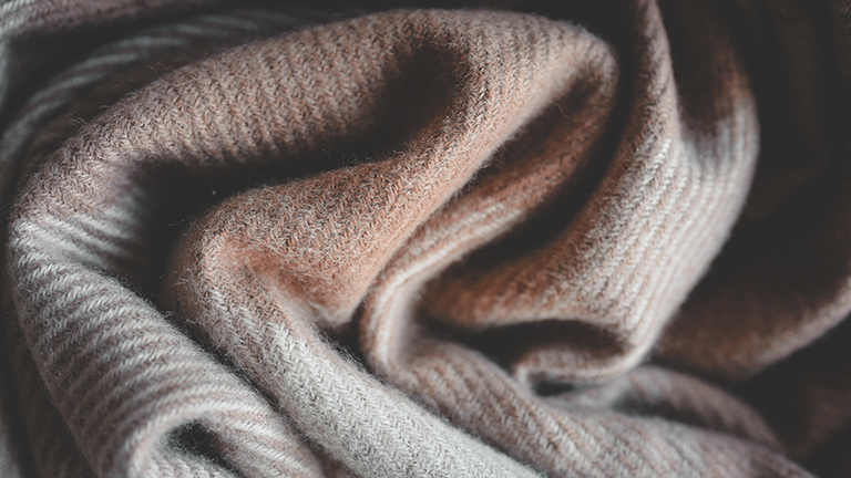 The soft folds of a cashmere blanket