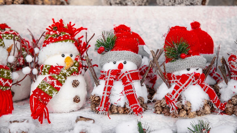 Festive snowmen decorations at a Christmas festival