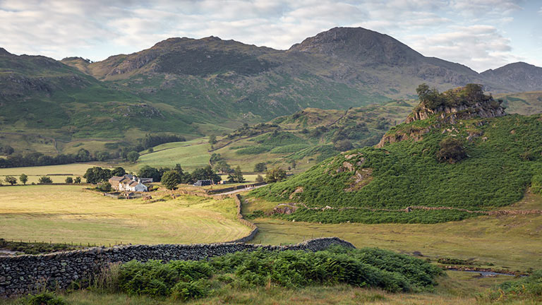 Views of Little Langdale towards Castle Howe at the foot of Fell Foot in the Lake District