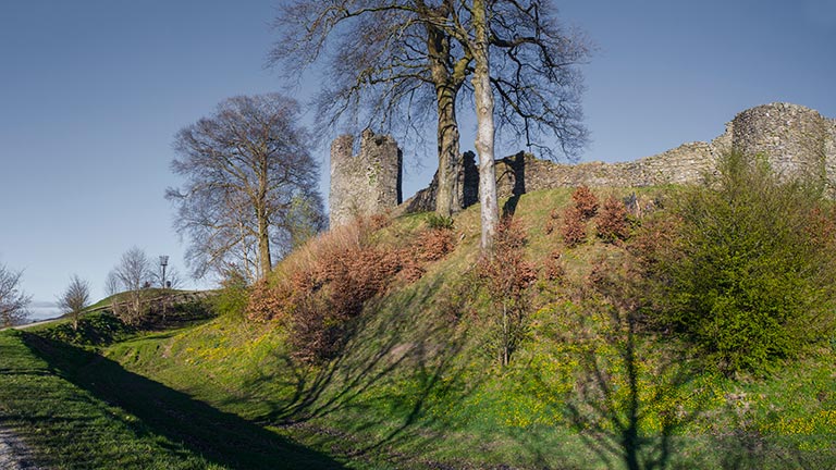 The ruins of Kendal Castle atop a glacial hill in Kendal in the Lake District