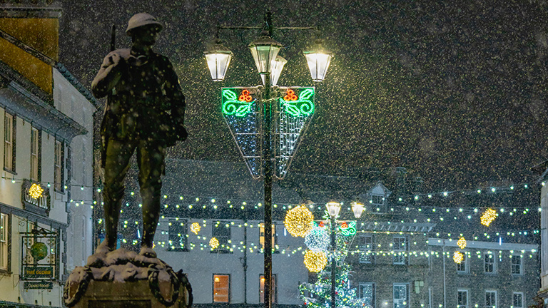 Snow falling in the town of Kendal at Christmas