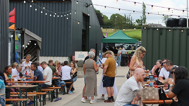 Guests sat outside brindle distillery in Chorley