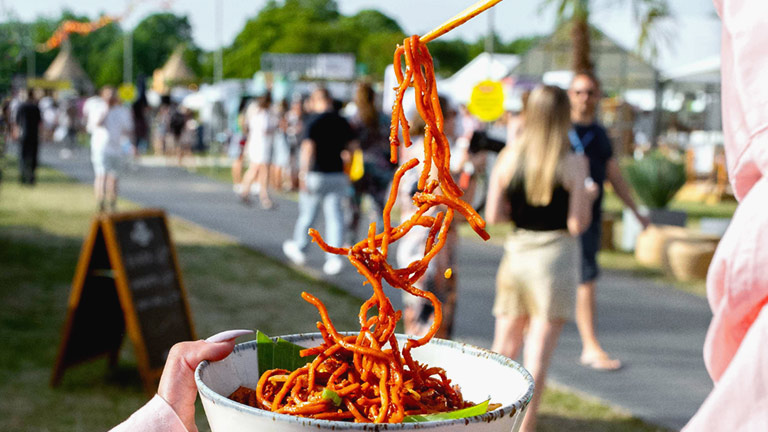 Noodles in a bowl ready to eat at Regent Park's Taste of London food festival