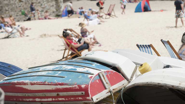 Photogenic boats on the beach in St Ives. St Ives has long been a magnet for artists and painters looking to make the most of the beautiful scenery and unique light. 