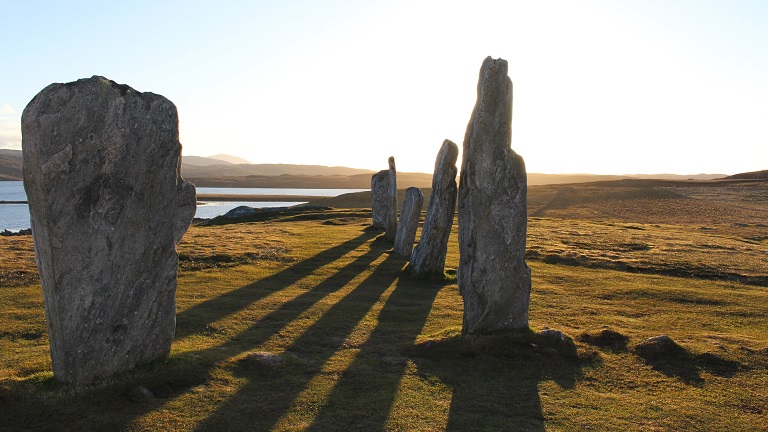 Stone megaliths overlooking the coastline along the Hebridean Way 