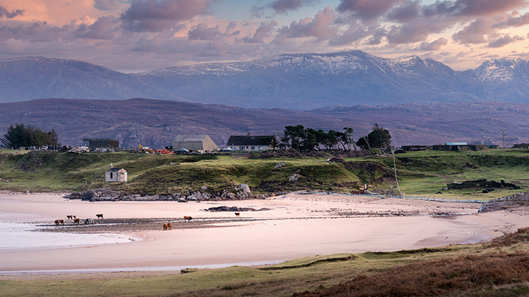 Poolewe Beach during a purple-hued sunset