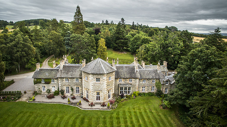 An aerial view of Coul House in the hills above Contin