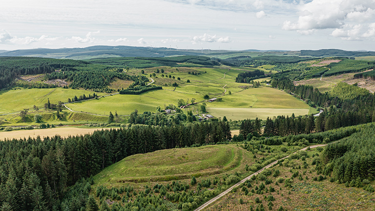 An aerial view of Castle O'er Iron Age Hill Fort