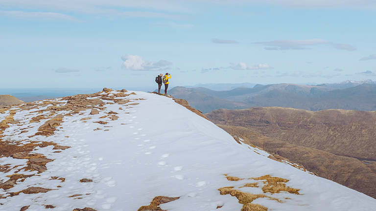 Hikers on Beinn Alligin in snow